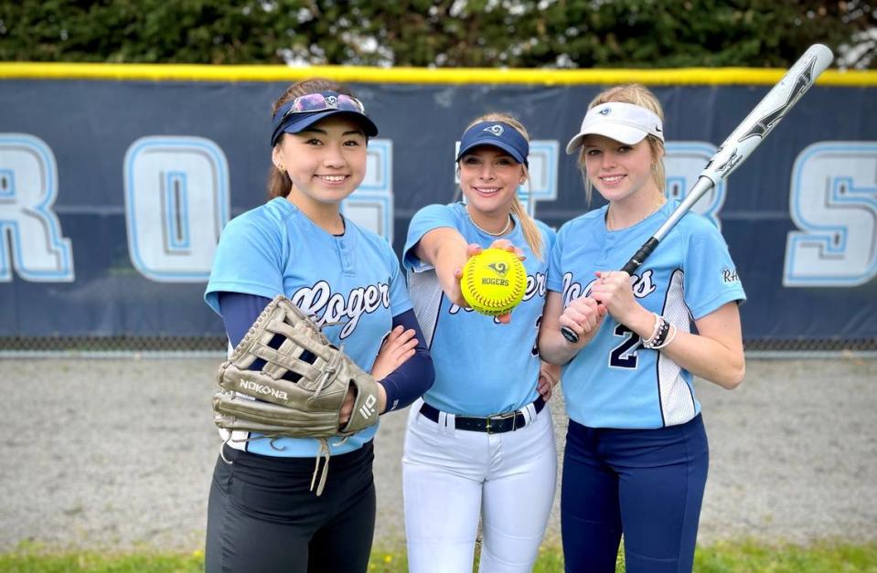 Rogers High School softball players, from left, Sydney Sasaki, Keagun Norfleet and Raygun Klippert have made the Rams a contender in the 4A SPSL this spring.