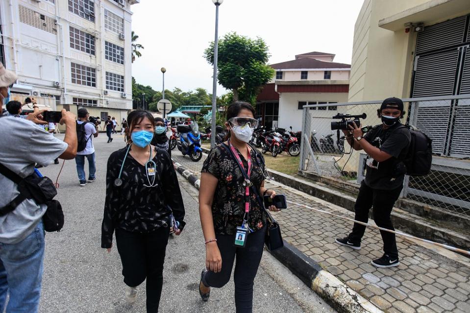 Doctors clad in black stage a walkout at the Penang General Hospital July 26, 2021. — Picture by Sayuti Zainudin