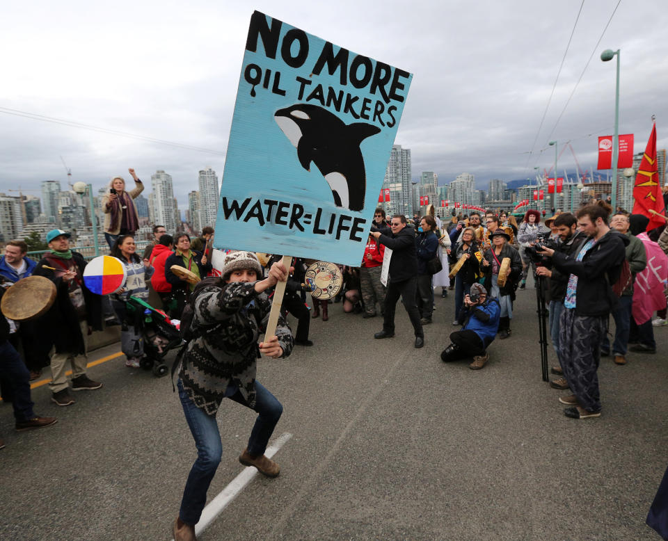 Protesters in Vancouver march against the proposed expansion of the Kinder Morgan Trans Mountain Pipeline. (Photo: Chris Helgren/Reuters)