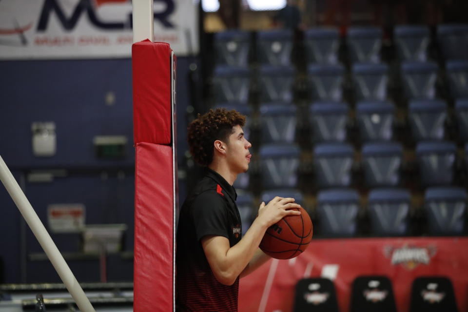 LaMelo Ball holds a basketball during warmups before an NBL match between the Illawarra Hawks and the Sydney Kings.