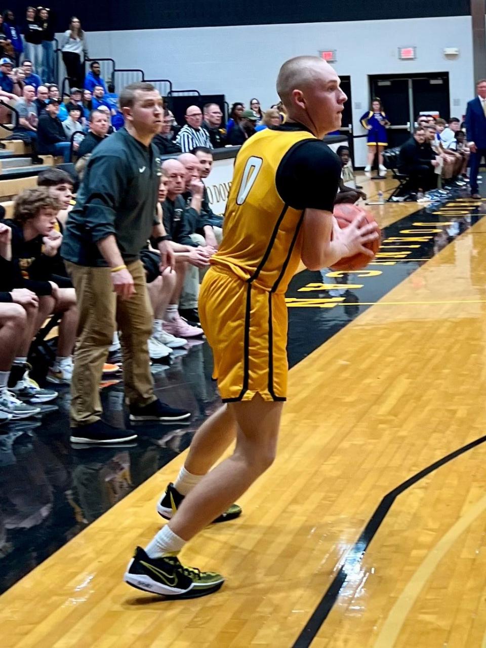 Northmor's Grant Bentley looks for a teammate  during Friday's Division IV boys basketball district championship game at Ohio Dominican.