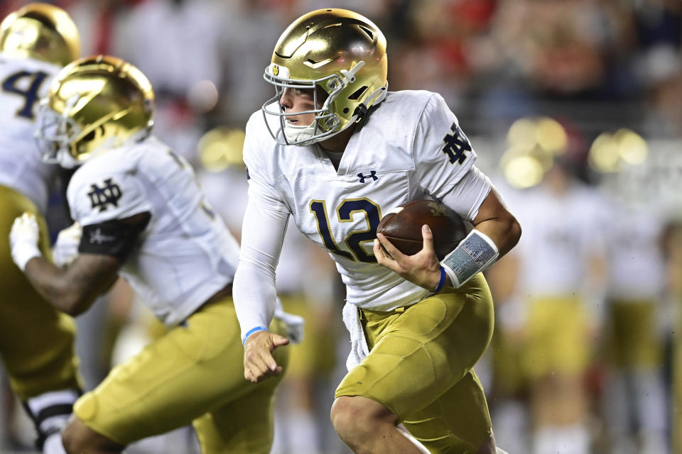 Notre Dame linebacker Jordan Botelho runs the ball during the second quarter of an NCAA college football game against Ohio State, Saturday, Sept. 3, 2022, in Columbus, Ohio. (AP Photo/David Dermer)