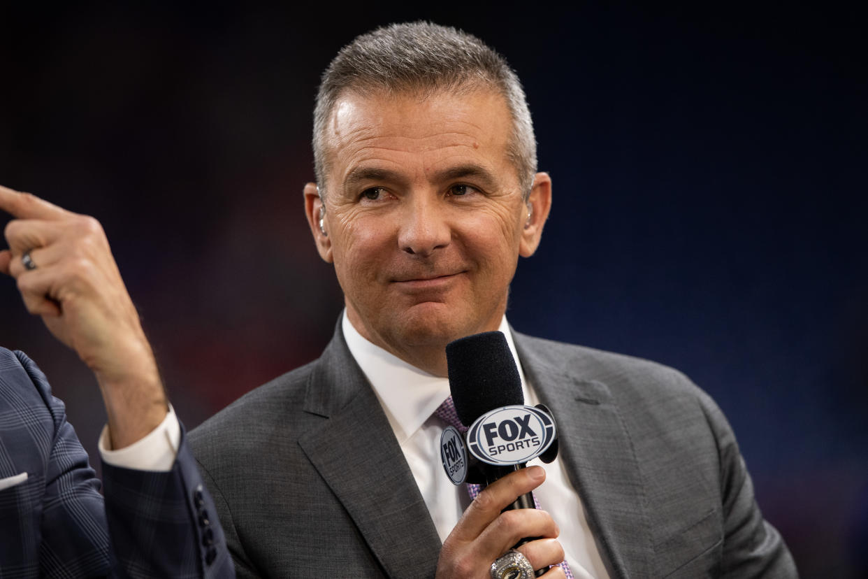 INDIANAPOLIS, IN - DECEMBER 07: Fox Sports analyst Urban Meyer on the sidelines before the Big 10 Championship game between the Wisconsin Badgers and Ohio State Buckeyes on December 7, 2019, at Lucas Oil Stadium in Indianapolis, IN. (Photo by Zach Bolinger/Icon Sportswire via Getty Images)