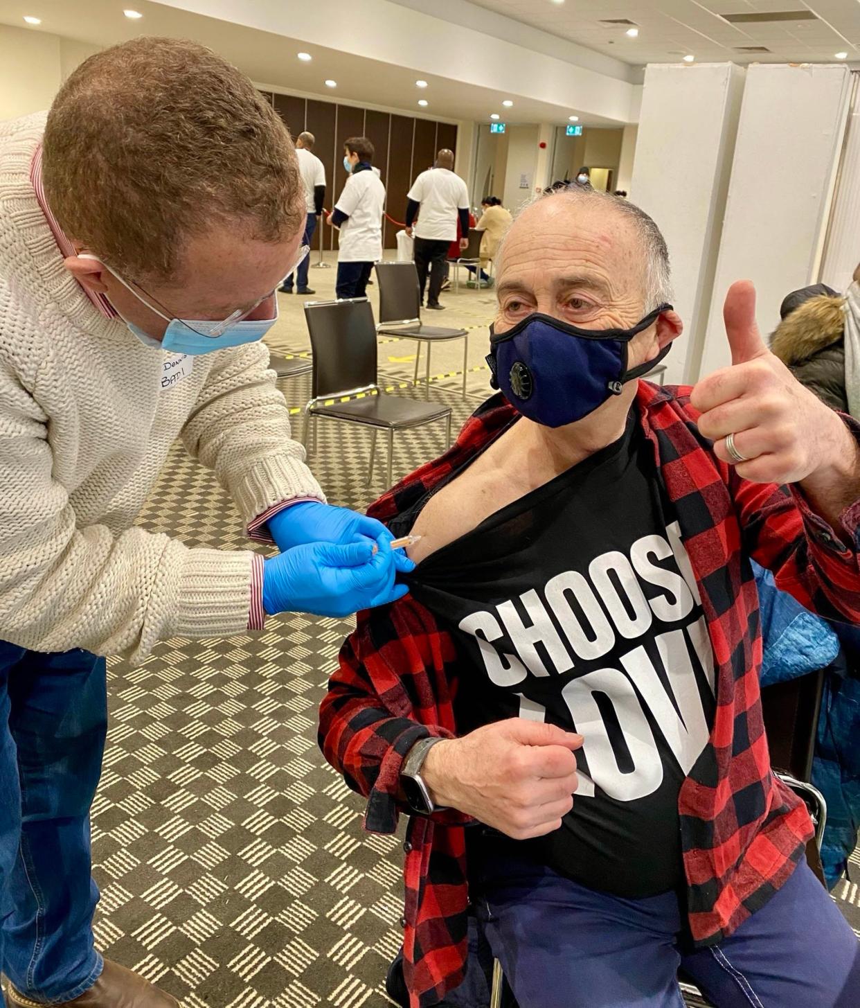 <p>Sir Tony Robinson getting his first of two covid vaccinations</p> (Sir Tony Robinson/PA Wire)