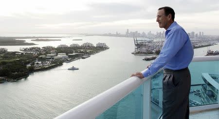 Thomas Herzfeld looks over the port of Miami from his apartment in Miami Beach, Florida December 23, 2014. REUTERS/Javier Galeano