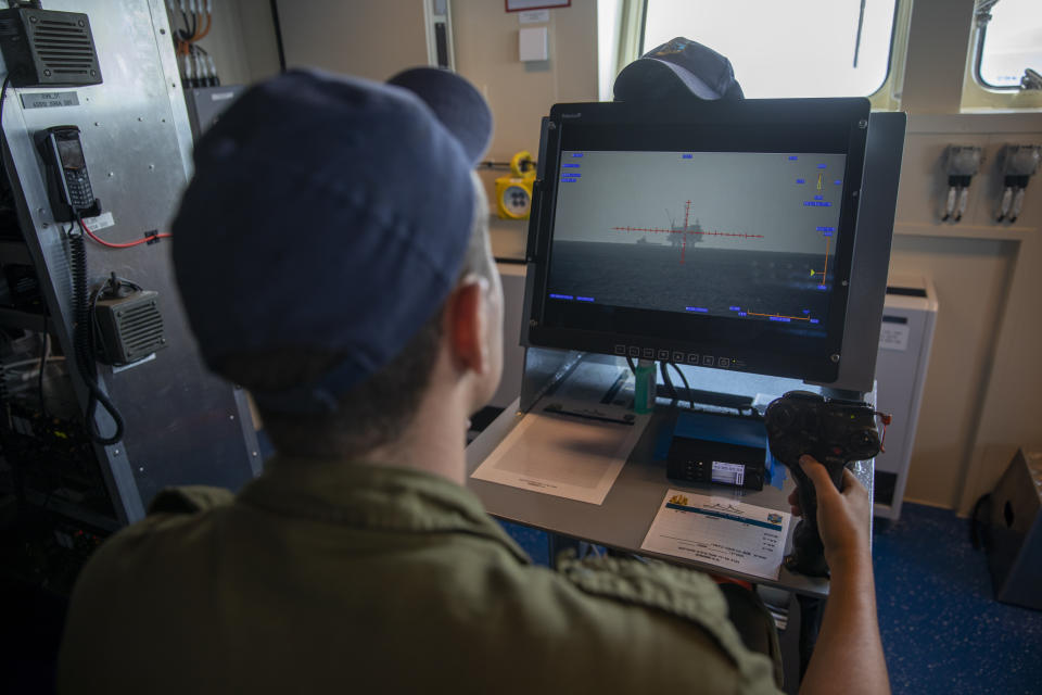 An Israeli Navy sailor looks at Israel's offshore Leviathan gas field on a computer screen, on board the Israeli Navy Ship Atzmaut, in the Mediterranean Sea, Wednesday, Sept. 1, 2021. One of the navy’s most important responsibilities is protecting Israel’s natural gas platforms in the Mediterranean Sea, which now provide some 75% of the country’s electricity. (AP Photo/Ariel Schalit)