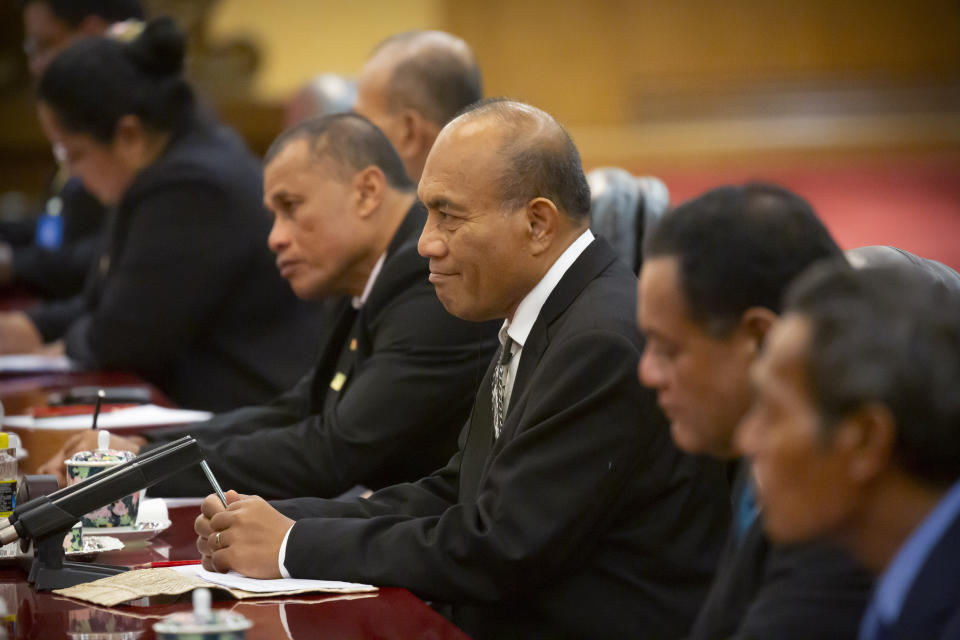 Kiribati's President Taneti Maamau, center, listens as Chinese President Xi Jinping speaks during a meeting at the Great Hall of the People in Beijing, Monday, Jan. 6, 2020. (AP Photo/Mark Schiefelbein, Pool)