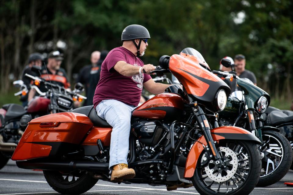 A rider takes out a new Harley-Davidson for a demo ride during a Harley-Davidson open house in 2018. The plant in York County is temporarily suspending operations because of a supply chain issue.