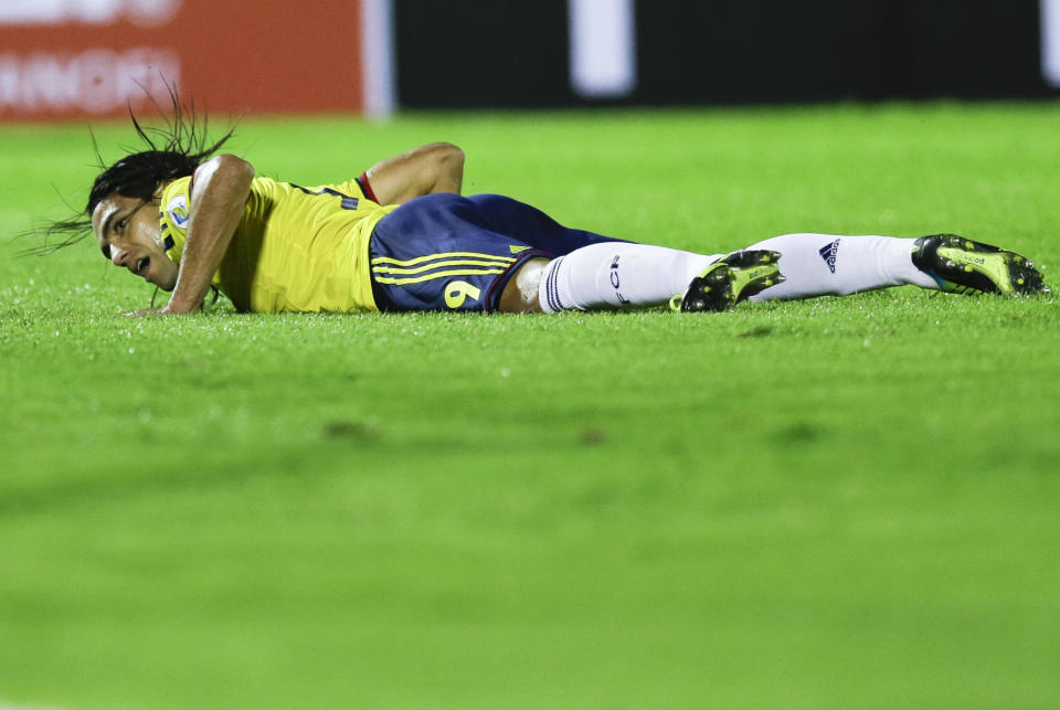 FILE - In this Sept. 10, 2013 file photo Colombia's Radamel Falcao Garcia looks up from the pitch during a 2014 World Cup qualifying soccer match against Uruguay in Montevideo, Uruguay. Falcao was injured this Wednesday, Jan. 22, 2014 during a French Cup game against Chasselay and is due to have further medical tests in the coming days to clarify the exact nature of the injury. (AP Photo/Natacha Pisarenko, File)