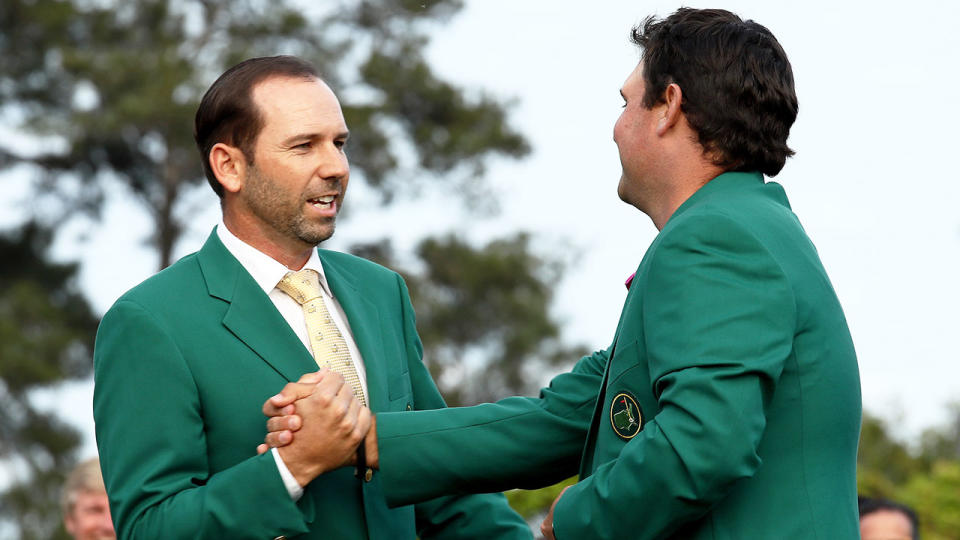 Pictured here, 2017 Masters champ Sergio Garcia presents 2018 winner Patrick Reed with his green jacket.