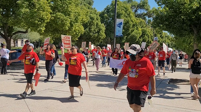 California State University, San Bernardino faculty marches through the San Bernardino campus on Oct. 19, 2023, in advance of the California Faculty Association’s strike, which was planned to begin on Monday, Jan. 22, 2024.