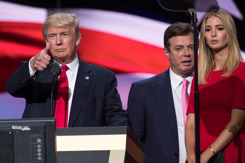 Paul Manafort stands between President Donald Trump and daughter Ivanka Trump in a picture taken during the 2016 Republican convention in Cleveland.