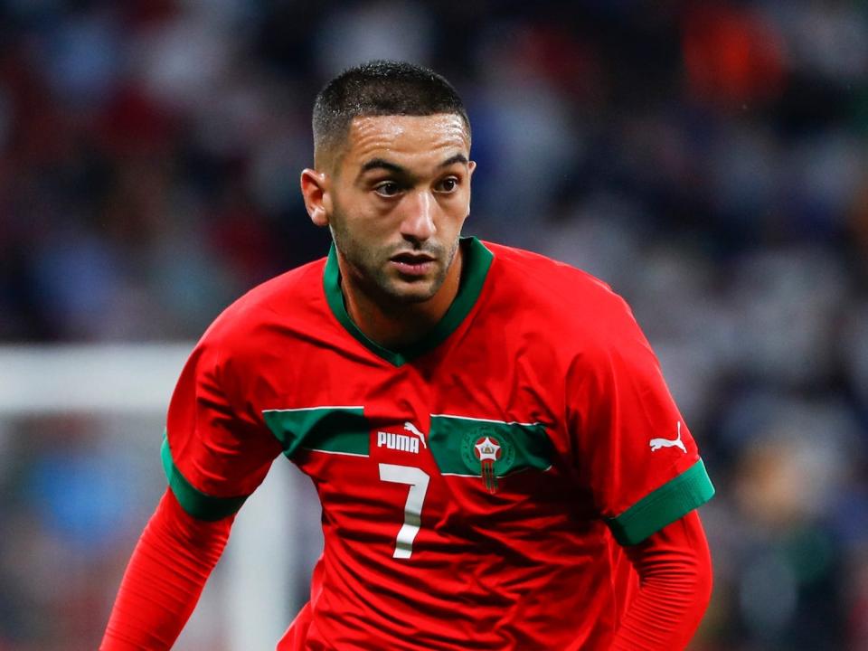 Hakim Ziyech runs during a Morocco soccer match.