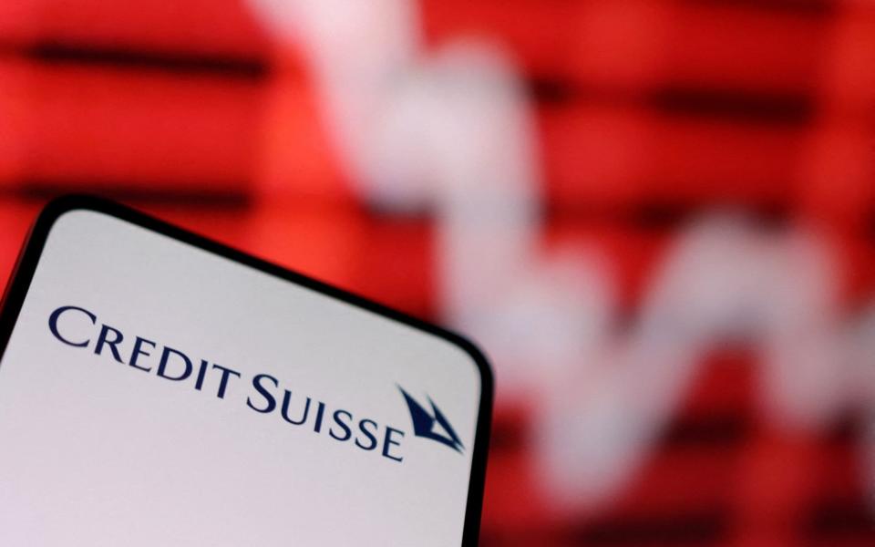 FILE PHOTO: FILE PHOTO: Credit Suisse logo and decreasing stock graph are seen in this picture illustration taken March 16, 2023. REUTERS/Dado Ruvic/Illustration/File Photo/File Photo - DADO RUVIC/REUTERS