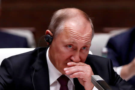 FILE PHOTO: Russian President Vladimir Putin attends a plenary session of BRICS (Brazil, Russia, India, China and South Africa) Summit, in Xiamen, China September 4, 2017. REUTERS/Tyrone Siu/File photo