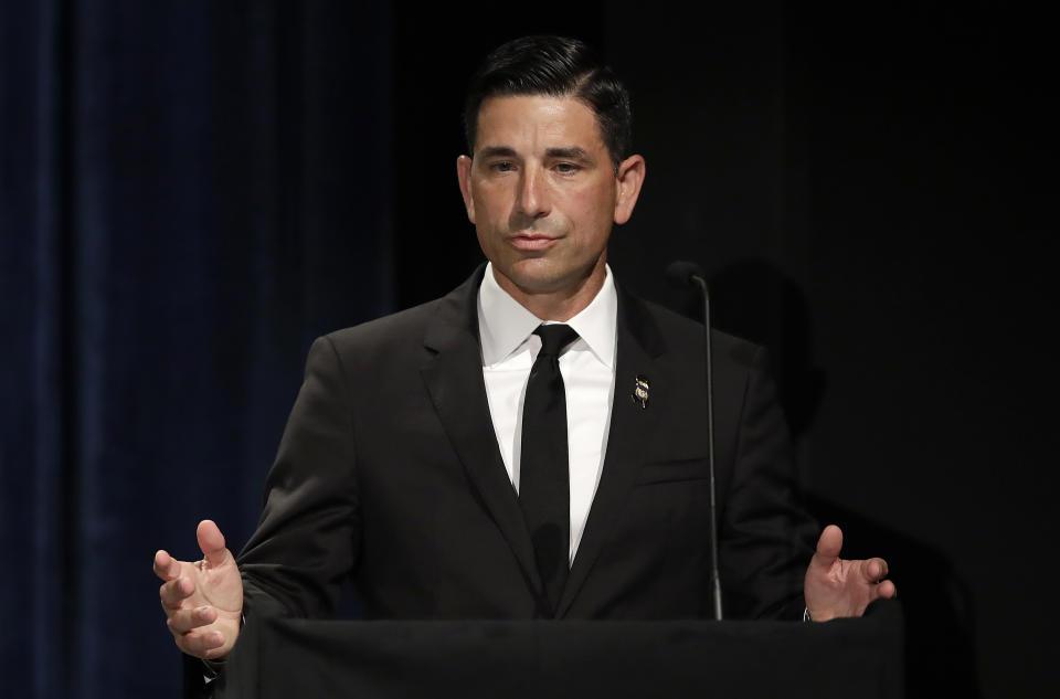 Chad Wolf, acting Secretary of Homeland Security, gestures while speaking during a memorial service for Federal Protective Services Officer Dave Patrick Underwood on Friday, June 19, 2020, in Pinole, Calif. Underwood was fatally shot as he was guarding the Ronald V. Dellums Federal Building in Oakland, Calif., amid protests on May 29. (AP Photo/Ben Margot)