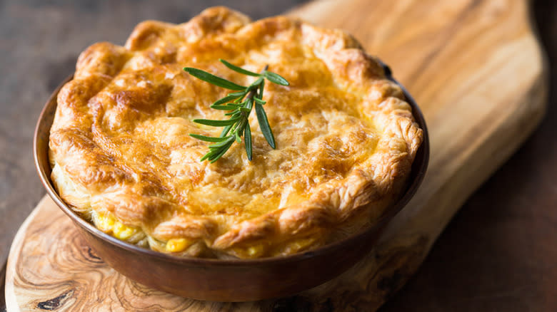 Pot pie in wooden bowl