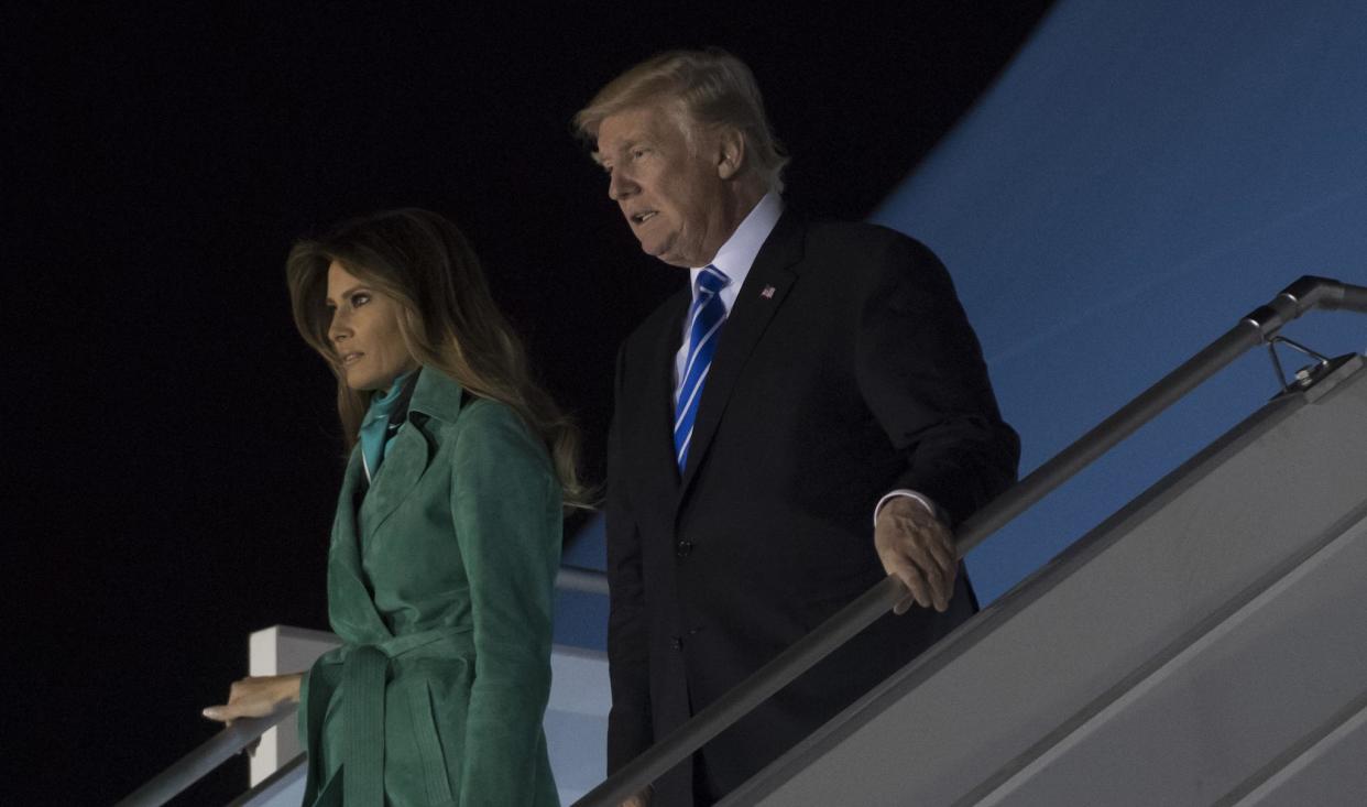 US President Donald Trump and First Lady Melania Trump arrive on Air Force One at Warsaw Chopin Airport in Warsaw, Poland, July 5, 2017, as they begin a 4-day trip to Poland and Germany: SAUL LOEB/AFP/Getty Images