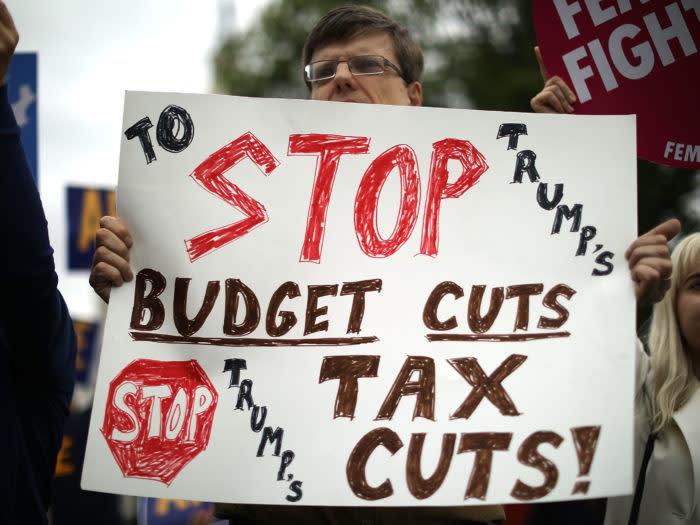 Photo of Sign Protesting Trump Budget Cuts