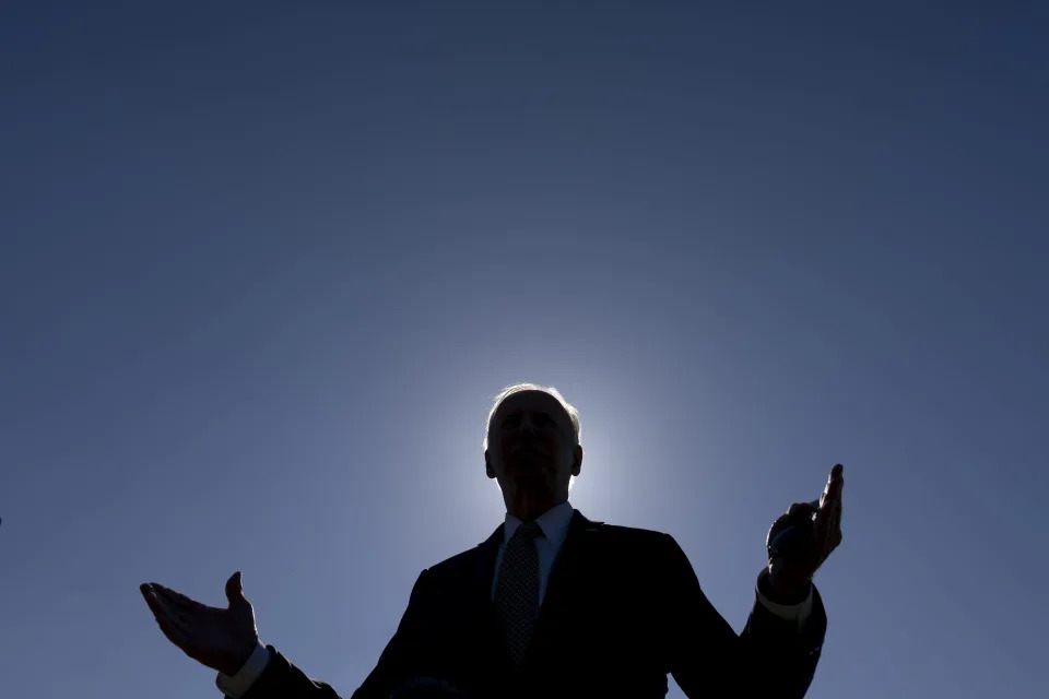 President Joe Biden speaks to members of the media at Fort Lesley J. McNair, Monday, April 4, 2022, as he returns to Washington and the White House after spending the weekend in Wilmington, Del. (AP Photo/Andrew Harnik)