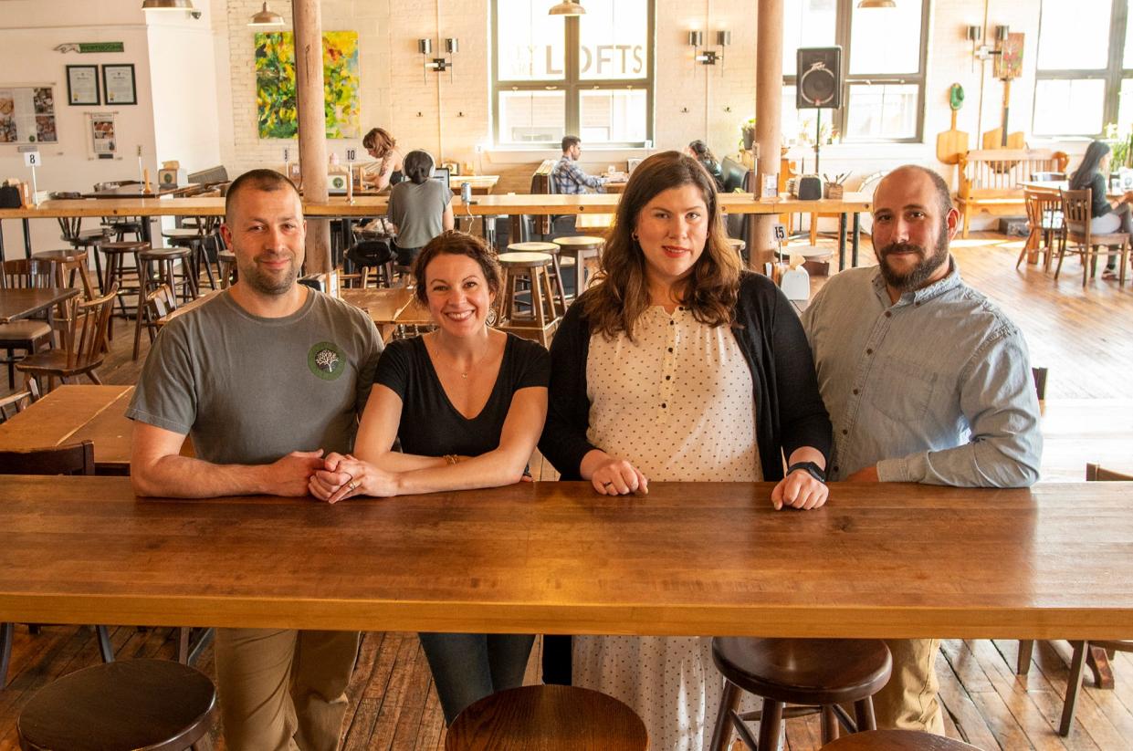 Rob Fecteau, Avra Hoffman, Alexis Kelleher and Nate Rossi inside BirchTree Bread Company last week. Fecteau and Hoffman recently sold BirchTree to Kelleher and Rossi, who also own two Crust Artisan Bakeshop locations in Worcester.
