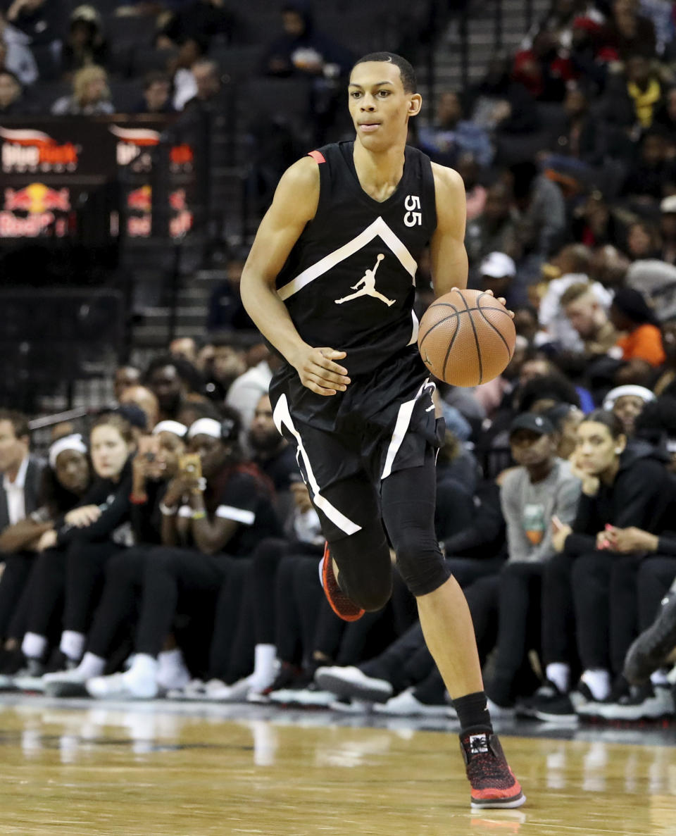 FILE - In this April 8, 2018, file photo, the Black Team's Darius Bazley (55) moves the ball against the White Team during the Jordan Brand Classic high school basketball game, in New York. Bazley skipped playing in college at Syracuse and has spent months training for the NBA draft. (AP Photo/Gregory Payan, File)