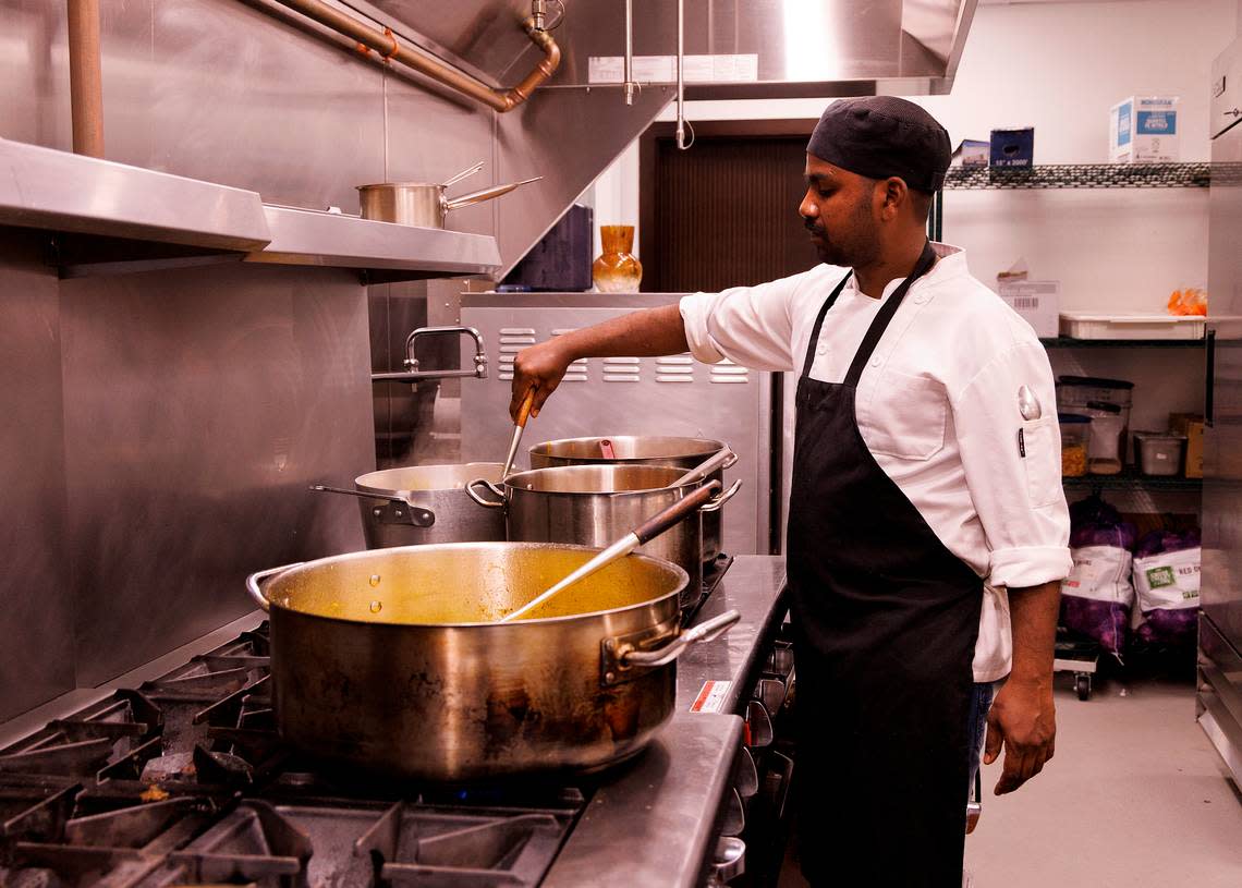 Manikandan works in the kitchen of Tamasha Modern Indian on Wednesday, May 8, 2024, in Raleigh, N.C.