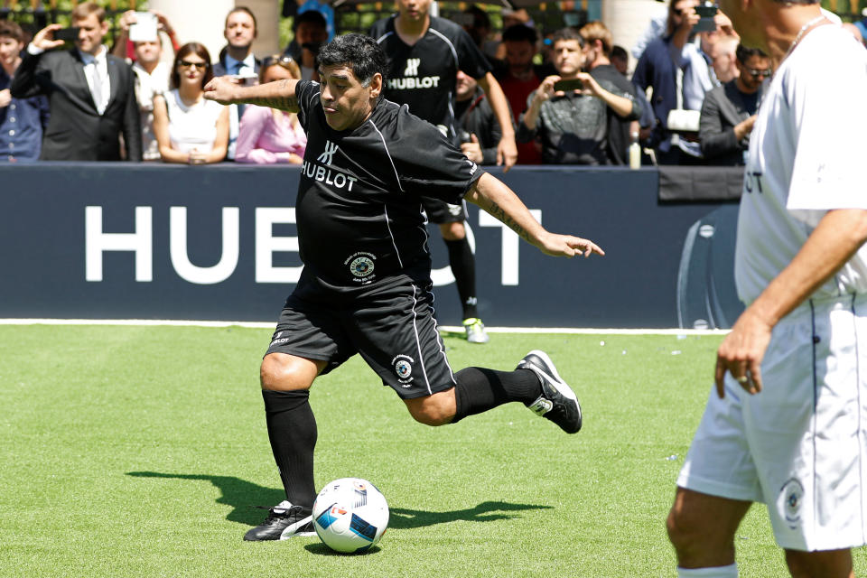 Football legend Diego Maradona plays soccer during an advertising event on the eve of the opening of the UEFA 2016 European Championship in Paris, France, June 9, 2016 .  REUTERS/Charles Platiau