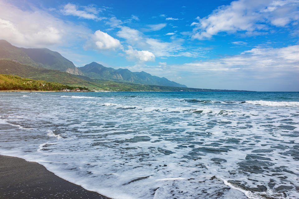 East Coast National Scenic Area with an awesome mountain range behind a pristine beach close to Taitung, Taiwan. (Photo: Gettyimages)