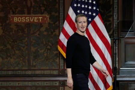 Facebook Chairman and CEO Mark Zuckerberg addresses the audience in Georgetown University's Institute of Politics and Public Service in Washington