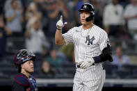 New York Yankees' Aaron Judge gestures as he scores on a solo home run off Cleveland Indians starting pitcher Zach Plesac during the fourth inning of a baseball game Friday, Sept. 17, 2021, in New York. (AP Photo/John Minchillo)