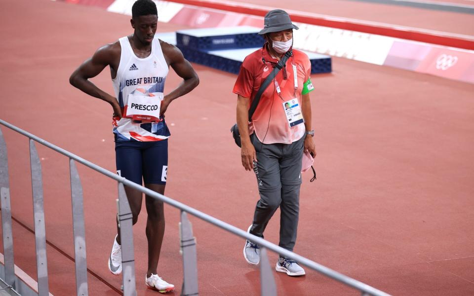 Reece Prescod of Britain walks off after being disqualified after a false start - Reuters