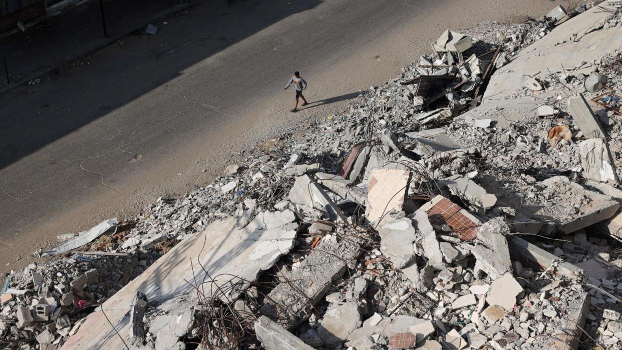 PHOTO: A Palestinian man walks past the rubble of buildings destroyed in previous Israeli bombardments, in Rafah, in the southern Gaza Strip, Apr. 30, 2024. (AFP via Getty Images)