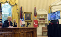 <p>President Donald Trump, accompanied by his daughter Ivanka Trump, talks via video conference with International Space Station Commander Peggy Whitson and Jack Fischer on the Space Station, Monday, April 24, 2017, from the Oval Office of the White House in Washington. (AP Photo/Susan Walsh) </p>