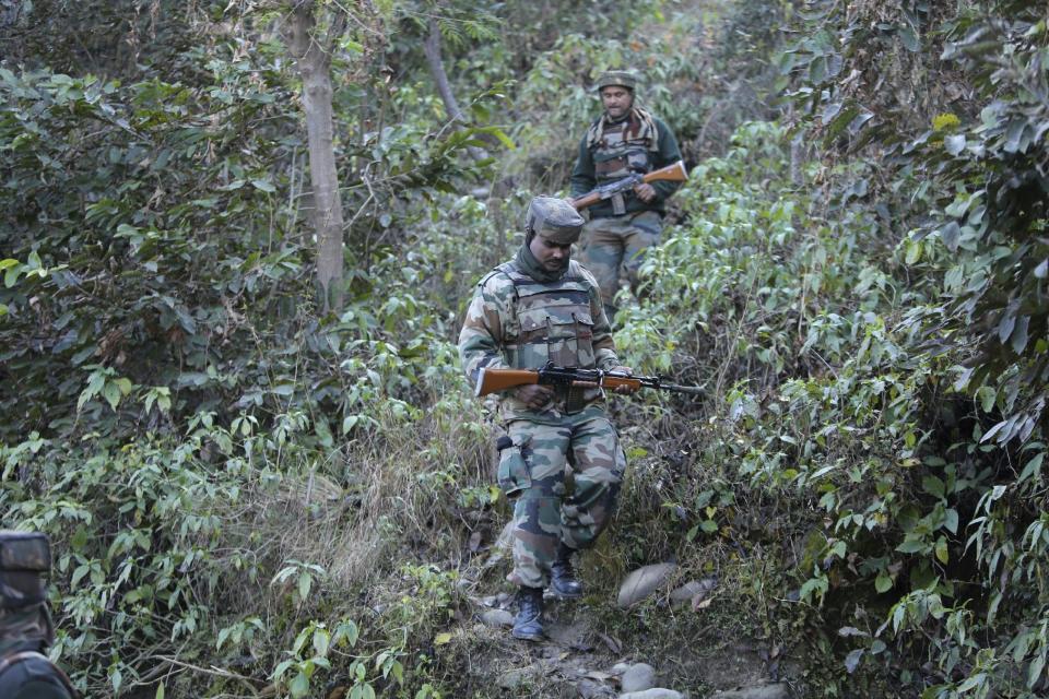 Indian army soldiers patrol during a search operation outside the camp of the General Engineering Reserve Force (GREF), the site of a militant attack, in the frontier Battal area, about 90 kilometers from Jammu, India, Monday, Jan. 9, 2017. The Indian army says three civilian laborers working with an army road construction crew were killed in a pre-dawn militant attack near the border with Pakistan in Indian-controlled Kashmir. (AP photo/Channi Anand)