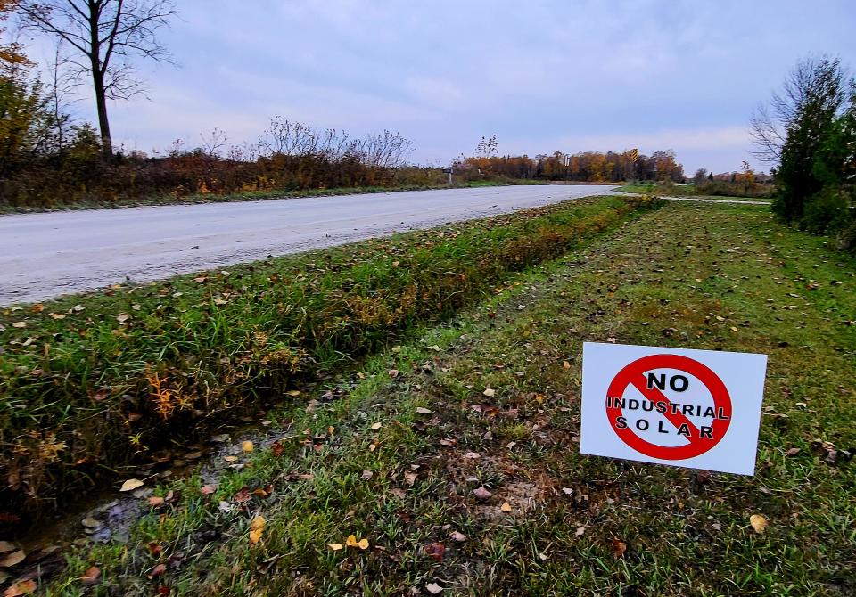 An anti-solar sign, some of which have popped up around Fort Gratiot, is posted at the edge of a yard along Carrigan Road on Thursday, Oct. 26, 2023.