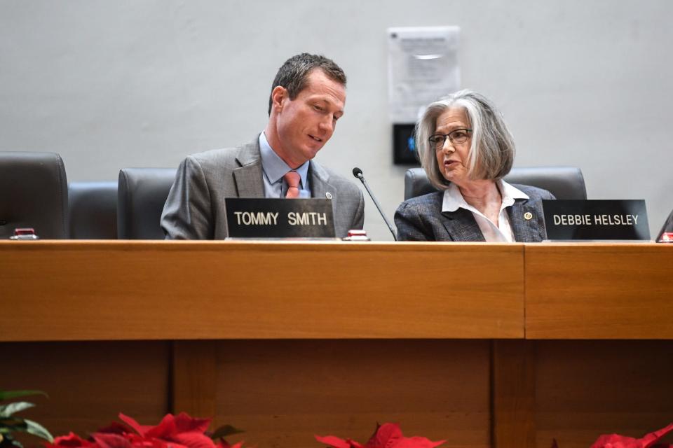 Councilman and Vice Mayor Tommy Smith speaks with new council member Debbie Halsley ahead of a Knoxville City Council meeting following Mayor Indya Kincannon's inauguration for her second term at the City County Building Dec. 16, 2023.