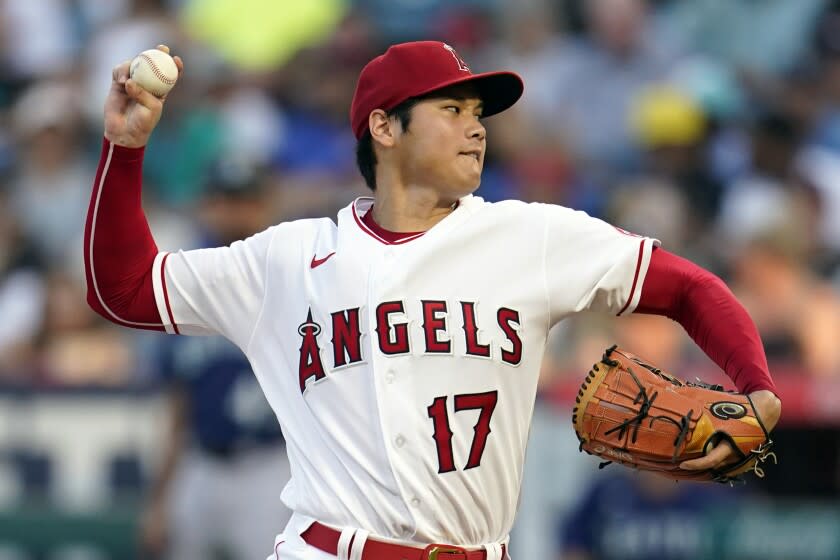 Los Angeles Angels starting pitcher Shohei Ohtani throws to a Seattle Mariners batter during the second inning of a baseball game Monday, Aug. 15, 2022, in Anaheim, Calif. (AP Photo/Marcio Jose Sanchez)