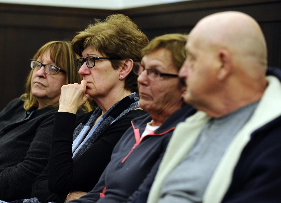 Family of stabbing victim Christopher Starkweather listen Wednesday during the arraignment in Gardner District Court of Francis Arbolay, who is charged with murder. T&G Staff/Christine Hochkeppel