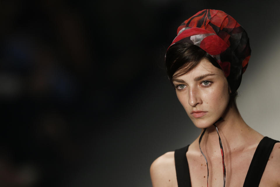 A model wears a creation from the 2nd Floor winter collection during Fashion Rio in Rio de Janeiro, Brazil, Friday, Nov. 8, 2013. (AP Photo/Felipe Dana)