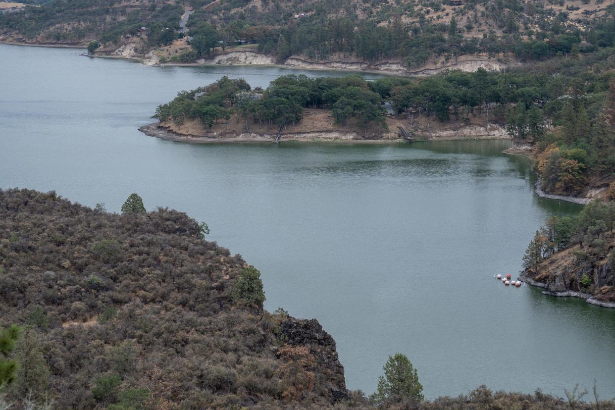 The local tribes hope taking down the four dams along the Klamath River, which created lakes such as the Copco Lake, will help restore fish habitats.