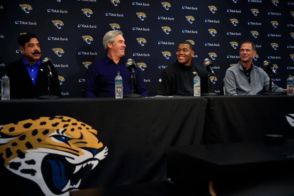 Jacksonville Jaguars owner Shad Khan, from left, head coach Doug Pederson, first round draft pick Travon Walker and General Manager Trent Baalke laugh at a light-hearted moment during a press conference Friday, April 29, 2022 at TIAA Bank Field in Jacksonville. Walker, a defensive lineman from the University of Georgia, was the overall No. 1 pick for the Jacksonville Jaguars in the 2022 NFL Draft. 