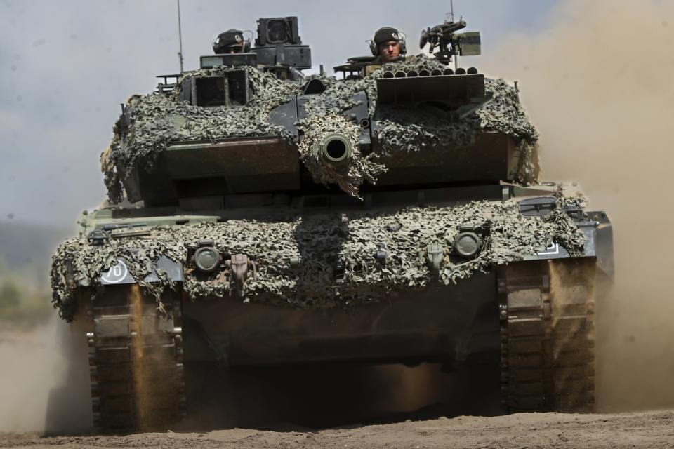 FILE - A Germany army Main battle tank Leopard 2A6 takes part in the Lithuanian-German military exercise 'Griffin Storm 2023' at a training range in Pabrade, some 60km (38 miles) north of the capital Vilnius, Lithuania on Monday, June 26, 2023. Russia’s armed forces are bruised but by no means beaten in the war in Ukraine, a top NATO military officer said Monday, as he laid out the biggest revamp to the organization’s military plans since the Cold War should Moscow dare to widen the conflict. (AP Photo/Mindaugas Kulbis, File)