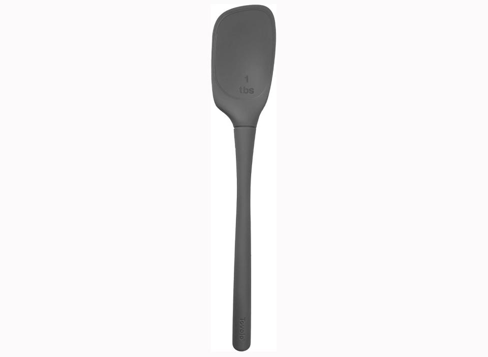 A multi-functional silicone spoon can be used for measuring and stirring, then easily cleaned in the dishwasher. (Source: Amazon)