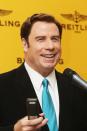 <p>Who would Travolta be without his "Greased Lightning" gelled back mane? </p>