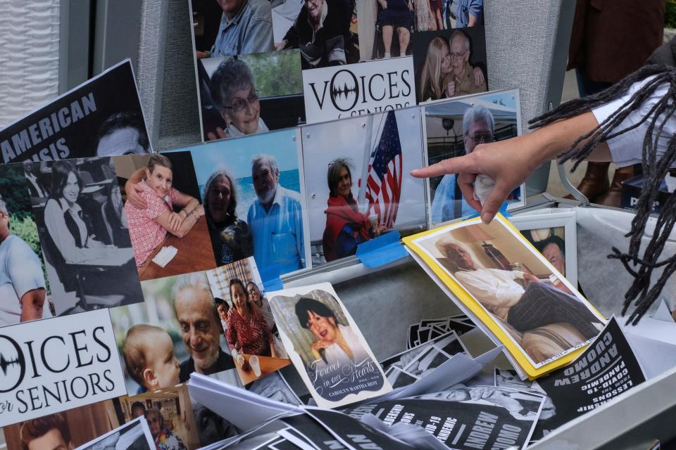 In this Sunday, Oct. 18, 2020 file photo, families of COVID-19 victims who passed away in New York nursing homes gathered in front of the Cobble Hill Heath Center in the Brooklyn borough of New York, to demand that then-Gov. Andrew Cuomo apologize for his response to clusters in nursing homes during the pandemic.