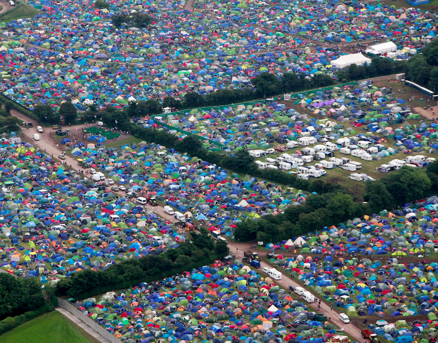 Sensible people have also arrived in camper vans to avoid sleeping on wet mud. (SWNS)