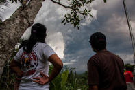 <p>Continuous eruption of volcano Agung with large volumes on Nov. 26, 2017 in Karangasem, Bali, Indonesia. Mount Agung belched smoke as high as 1,500 metres above its summit, sparking an exodus from settlements near the mountain. (Photo: Muhammad Fauzy/NurPhoto via Getty Images) </p>