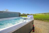 <p>Want a Cornwall Airbnb with a hot tub? Check out The Shippon on the edge of Bodmin Moor. The converted barn affords a peaceful location and all the essentials for a romantic break. </p><p>There's the International Dark Sky Landscape for stargazing, the private hot tub for a bubbly soak and the seclusion to feel a world away from the stresses of daily life.</p><p><strong>Sleeps</strong>: 2</p><p><strong>Price per night:</strong> £107</p><p><strong>Why we love it: </strong>The relaxing views and rural location. If you want to get away from it all in a spot with amazing views, The Shippon won't disappoint.</p><p><a class="link " href="https://go.redirectingat.com?id=127X1599956&url=https%3A%2F%2Fwww.airbnb.co.uk%2Frooms%2F15479487%3Fsource_impression_id%3Dp3_1592740934_PxPIPakoAhVTf2cd%26guests%3D1%26adults%3D1&sref=https%3A%2F%2Fwww.countryliving.com%2Fuk%2Ftravel-ideas%2Fstaycation-uk%2Fg32930188%2Fairbnb-cornwall-devon%2F" rel="nofollow noopener" target="_blank" data-ylk="slk:SEE INSIDE;elm:context_link;itc:0;sec:content-canvas">SEE INSIDE</a></p>