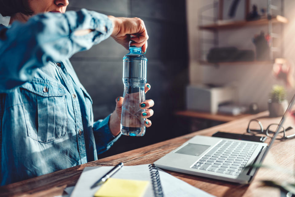 Upping your water intake could boost your afternoon energy. (Getty Images)